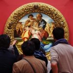 Viewers in front of Michelangelo’s Doni tondo (c. 1506) Uffizi Gallery, Florence